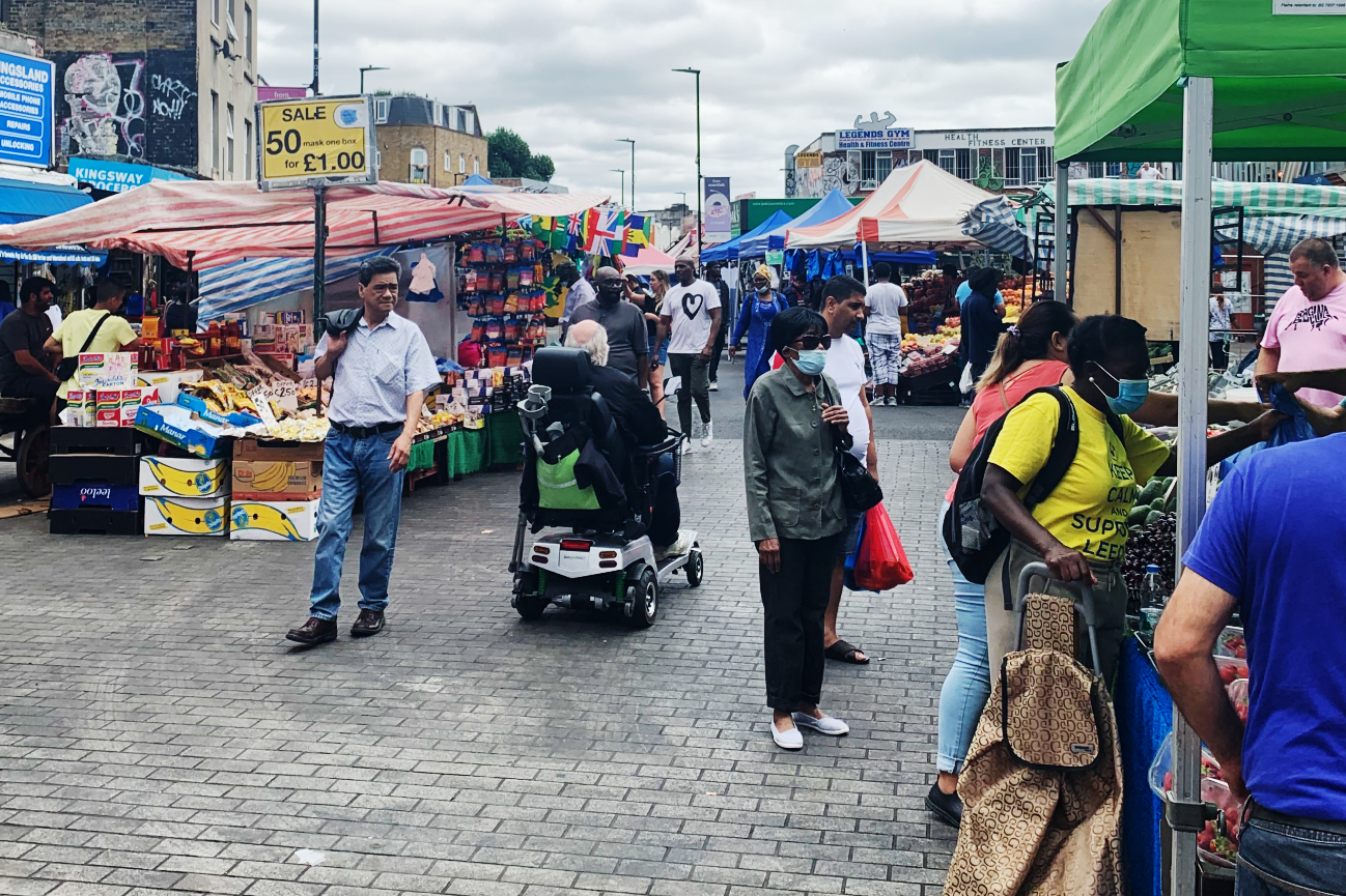 people shopping at Ridley Road market in London